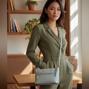 EUC Light Blue Anne Klein Crossbody Bag w/ butterfly charm